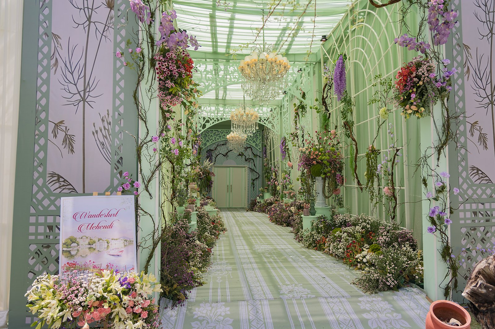 A floral corridor dressed for the mehendi