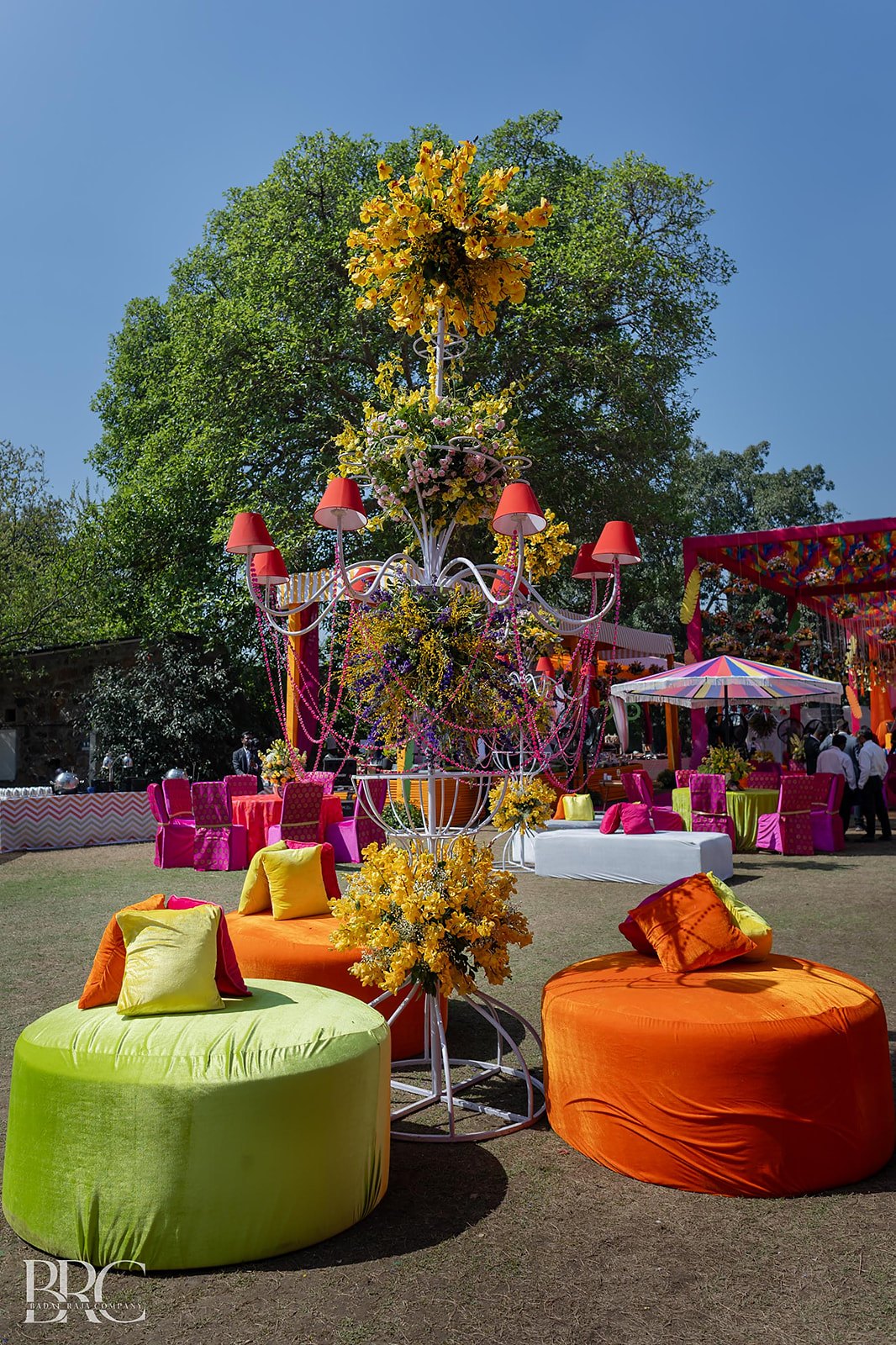 A garden mandap framed by palms